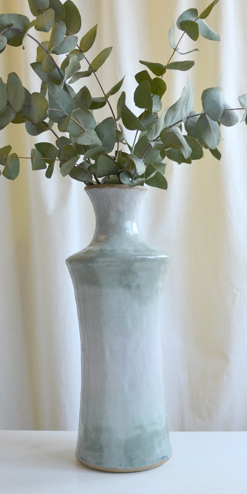 Tall jar style vase in a glossy white and green design